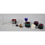 A Collection of Cased Medicine Glasses, Measuring Glass, Amber Glass Novelty Scent Bottle in the