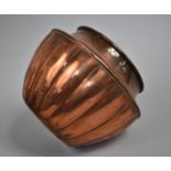 A Copper Ribbed Vase, Registered Trademark JH Stamp to Base, 15cms High