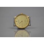 A 9ct Gold Gents Accurist Wrist Watch, Champagne Dial with Baton Markers, Face 33cms Diameter with