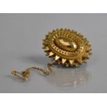 A Victorian Yellow Metal Mourning Brooch in The Etruscan Style Comprising Hearts and Central Faceted