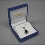 A 9ct White Gold and Sapphire Pendant, Central Oval Cut Sapphire (Untested) Measuring 10mm by 8mm in