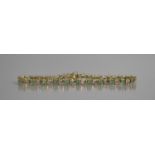 A 9ct Gold, Emerald and Diamond Tennis Bracelet comprising 23 Round Cut Emeralds, Each Approx 0.