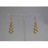 A Pair of 18ct Gold Earrings, Graduated Diamond Shaped Drops Measuring 35mms Length by 13mm Width (