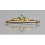 An Edwardian Gold Coloured Metal Brooch, Floral Design Set with Turquoise Cabochon and Seed