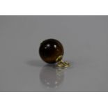 A 9ct Gold Mounted Tigers Eye Spherical Charm, 12mm Diameter, Stamped HS and with Import Mark for