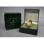 A Ladies Gucci Wrist Watch, Model 3400L, Mother of Pearl Dial and Gold Coloured Hands, Face