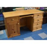 A Modern Pine Kneehole Desk, with Centre Keyboard Slide, Drawers and Cupboard, 152cm wide