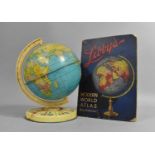 A 1960s Tinplate Children's Globe together with a Vintage Libby's Atlas