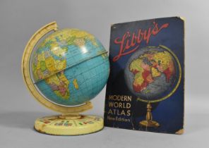A 1960s Tinplate Children's Globe together with a Vintage Libby's Atlas