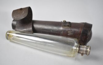 A Vintage Leather Cased Glass Saddle Flask, 25cms Long