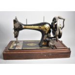 A Vintage Cased Singer Sewing Machine