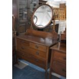 An Edwardian Inlaid Mahogany Bedroom Chest with Two Short and Two Long Drawers, Circular Swing