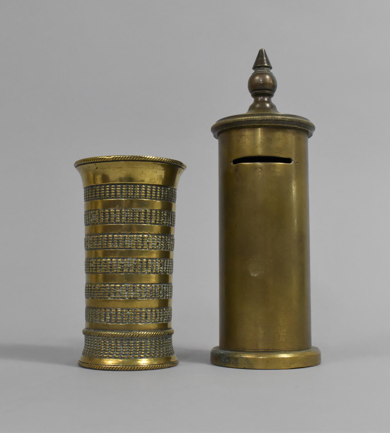 A WWI Trench Art Circular Money Box and a Banded Vase, 18cm high