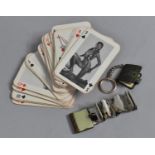 A Pack of What Butler Saw Playing Cards together with two Vintage Novelty Keyring Books containing