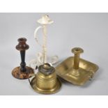 A Small Brass Oil Lamp, Brass Bed Chamber Stick, Wrought Iron Candlestick and Tortoiseshell Example