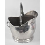 A Polished Aluminium Helmet Shaped Coal Scuttle