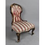 A Late 19th Century Buttoned Upholstered Ladies Nursing Chair with Serpentine Front and Scrolled