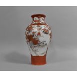 A Japanese Kutani Vase of Baluster Form decorated in the Usual Palette with Gilt Highlights and