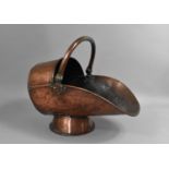 A Late 19th/Early 20th Century Copper Helmet Shaped Coal Scuttle, 41cm Long
