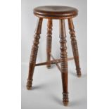 An Edwardian Circular Topped Stool, 61cms High