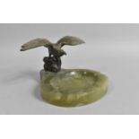 A Mid 20th Century Green Onyx Ash Tray with Bronze Effect Eagle having Wings Outstretched on Rock,