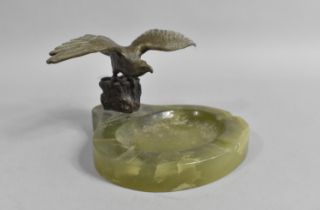 A Mid 20th Century Green Onyx Ash Tray with Bronze Effect Eagle having Wings Outstretched on Rock,