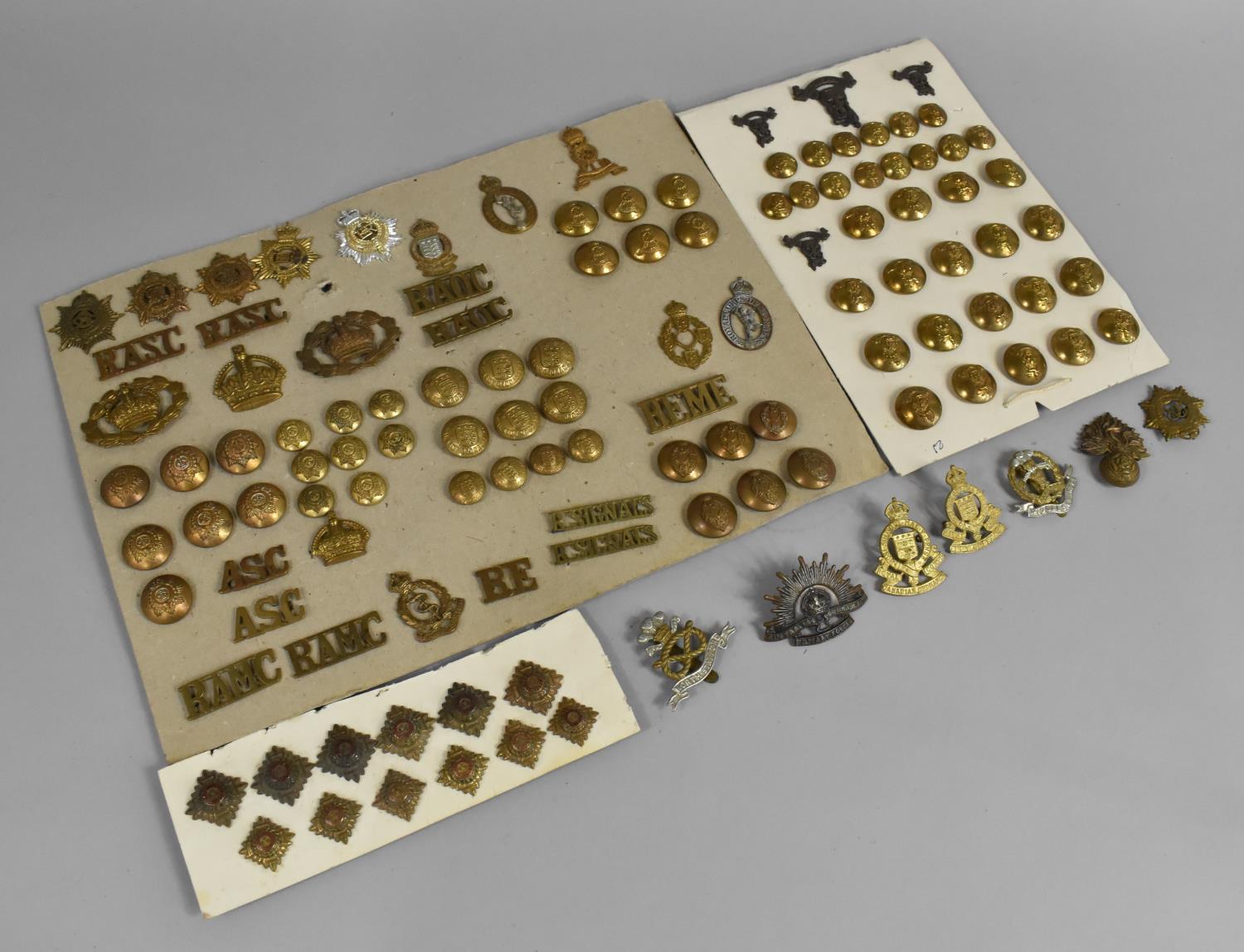 A Large Collection of Regimental Military Buttons and Badges