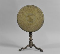 A 19th Century Brass Candle Reflector in the Form of a Circular Snap Top Tripod table, 24cms High