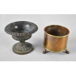 A Copper and Brass Circular Plant Holder with Three Claw Feet, 9.5cms Diameter together with a