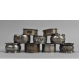 A Collection of Nine Various Silver Napkin Rings