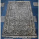 A Silk Tabriz Rug, 182 x 118cms