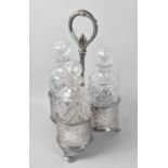 A Victorian Silver Plated Decanter Carrier with Three Cut Glass Bottle Decanters, by Martin Hall &
