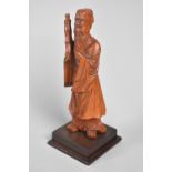 A Carved Far Eastern Wooden Study of an Elder Scribe, 18cms High