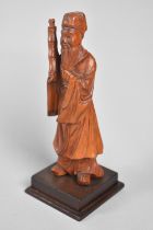 A Carved Far Eastern Wooden Study of an Elder Scribe, 18cms High