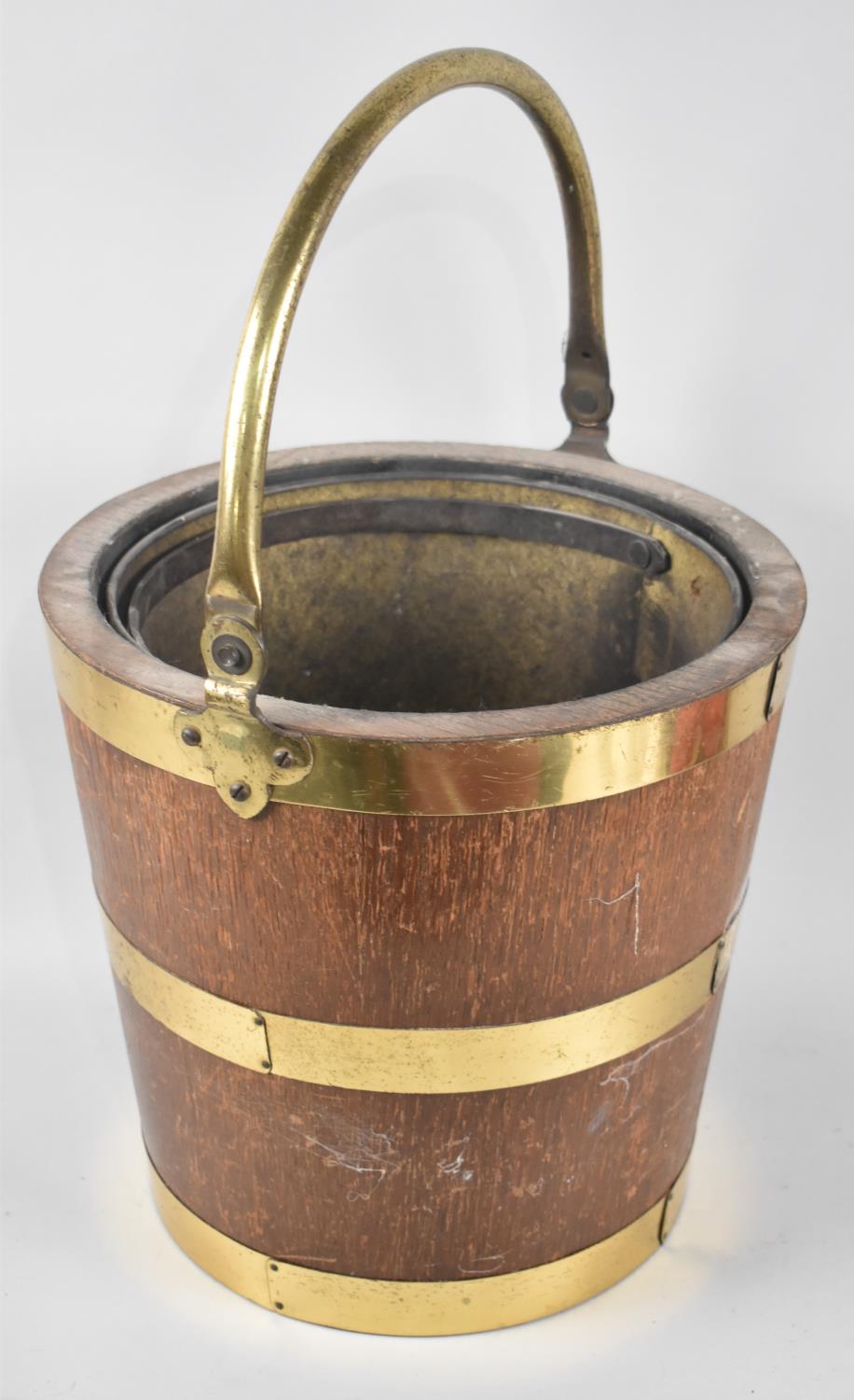 A Mid 20th Century Brass Banded Wooden Coal Bucket with Brass Inner Liner, 32cms Diameter