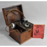 A Vintage Oak Cased Crystal Radio Set with Headphones and Basic Wireless Instruction Book