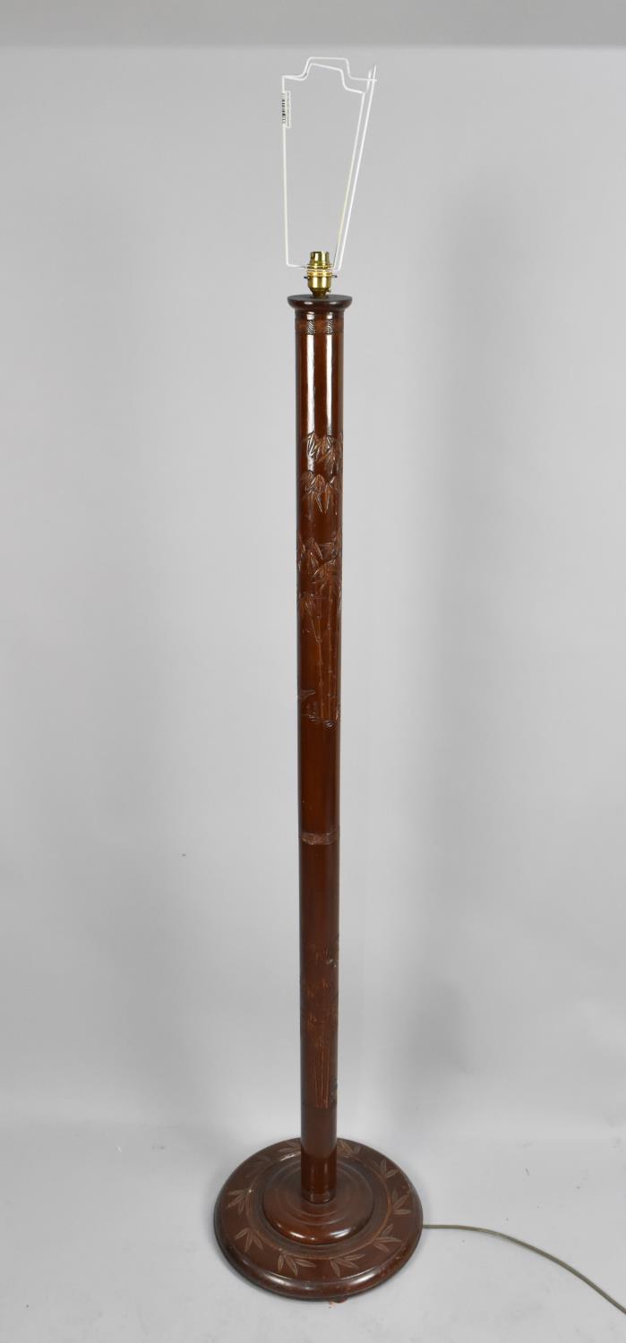 A Modern Chinoiserie Standard Lamp with Carved Decorated