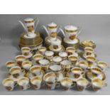 A Large German Bavarian Gilt and Fruit Decorated Service to comprise Cups, Saucers, Teapots,