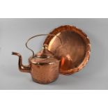 A Vintage Copper Kettle and a Circular Copper Tray, 31cms Diameter