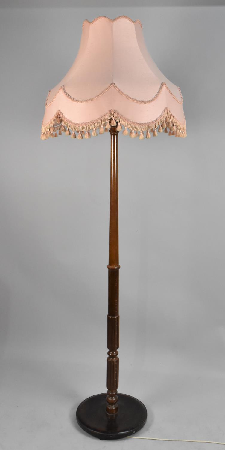 A Mid 20th Century Mahogany Standard Lamp and Shade