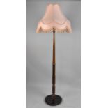 A Mid 20th Century Mahogany Standard Lamp and Shade