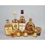 A Collection of Various Bottles of Blended Scotch Whisky, Haig, White Horse and Bells