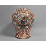 A Chinese Vase of Baluster Form Decorated in the Imari Palette with Central Vase of Flowers on