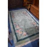 A Chinese Woollen Rug, 250x125cm