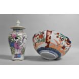 A Chinese Porcelain Lidded Baluster Vase Decorated in the Famille Rose Palette with Mother and Child