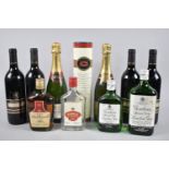 A Collection of Wines and Spirits to include Four Bottles Red Wine, Two Bottles of Champagne, Two