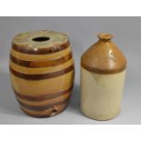 A Treacle Glazed Stoneware Oval Barrel, Missing Tap, together with a Stoneware Jar, Henry Luker