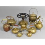 A Collection of Various Brass Kettles