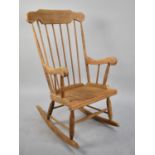 A Mid 20th Century Spindle Back Rocking Chair