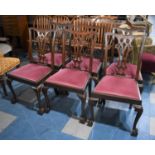 A Set of Six Mahogany Framed Reproduction Chippendale Dining Chairs